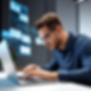 A focused individual working on a laptop, engaged in email management tasks.